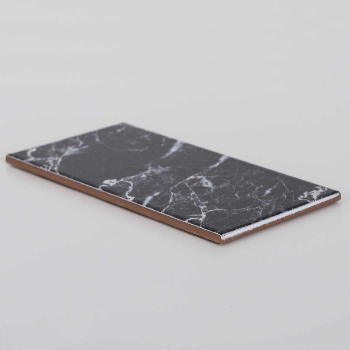 Kakel Marquina Marmor 10x20